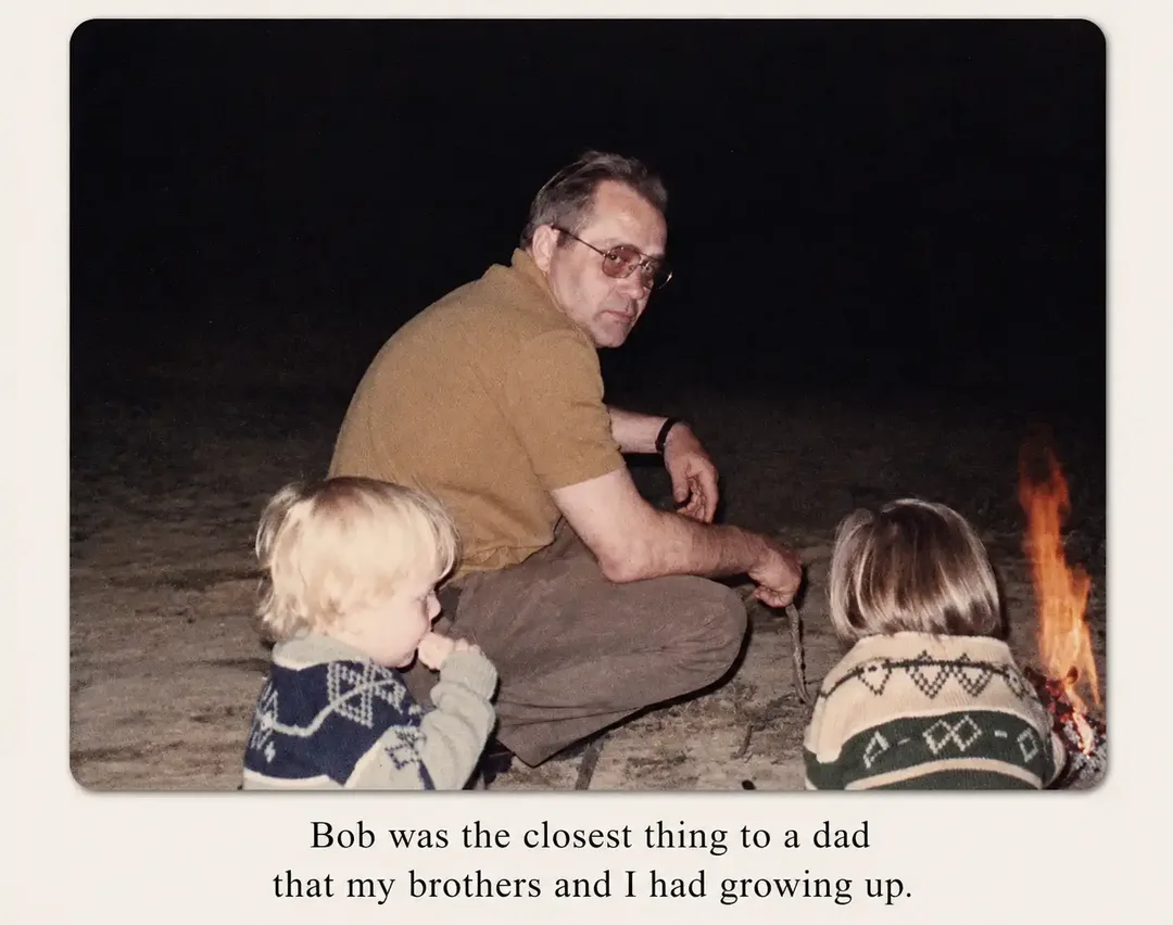 Bob, Rick, and Sean roasting marshmallows by the campfire.